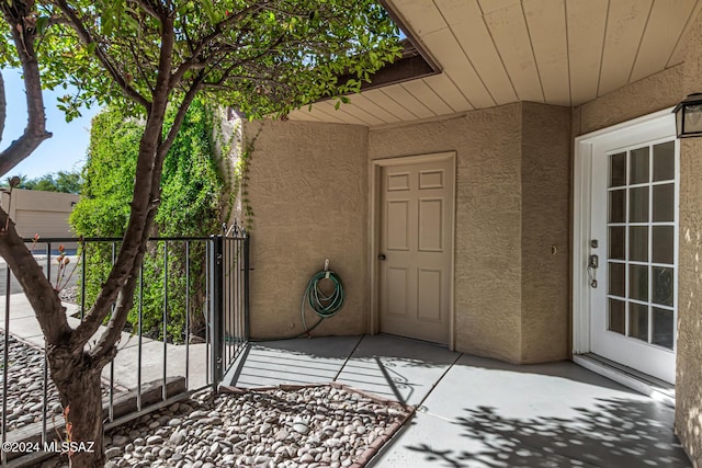 exterior space with stucco siding