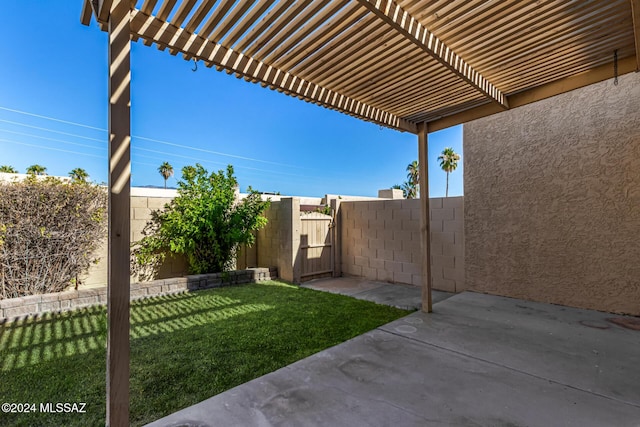 view of yard with a patio, fence, a gate, and a pergola