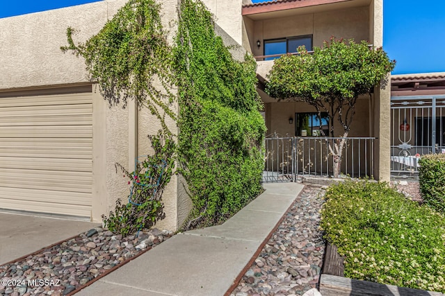 exterior space featuring stucco siding