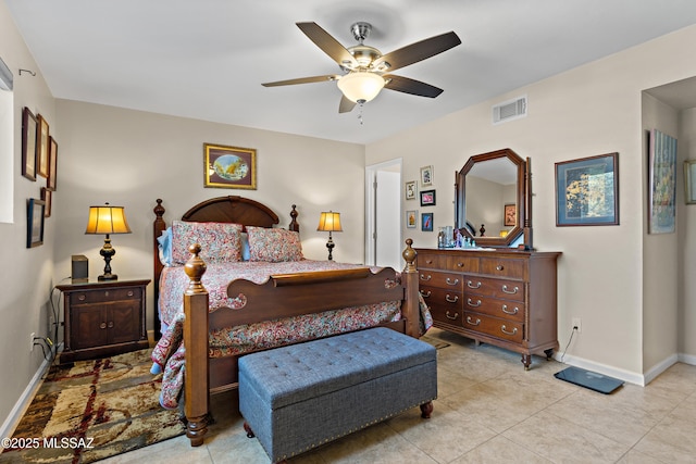 tiled bedroom featuring ceiling fan, visible vents, and baseboards