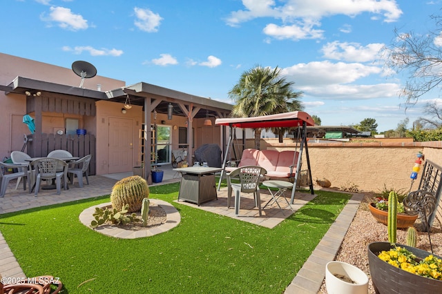 view of yard featuring a patio area and fence