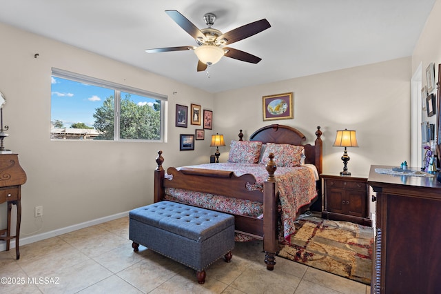 bedroom with baseboards, a ceiling fan, and light tile patterned flooring