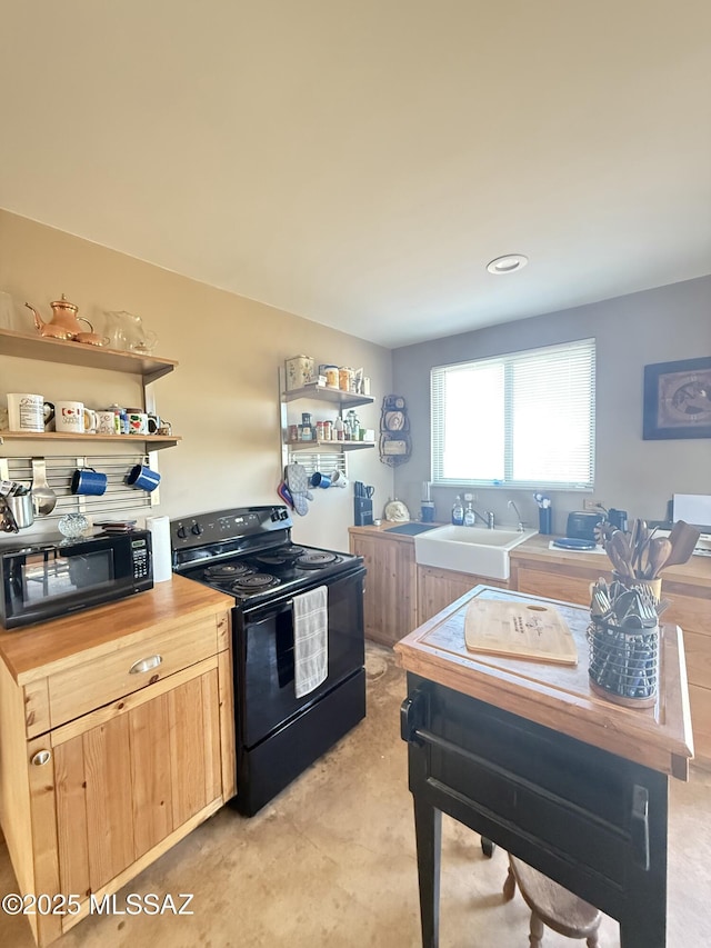 kitchen with butcher block counters, light brown cabinetry, black appliances, open shelves, and a sink