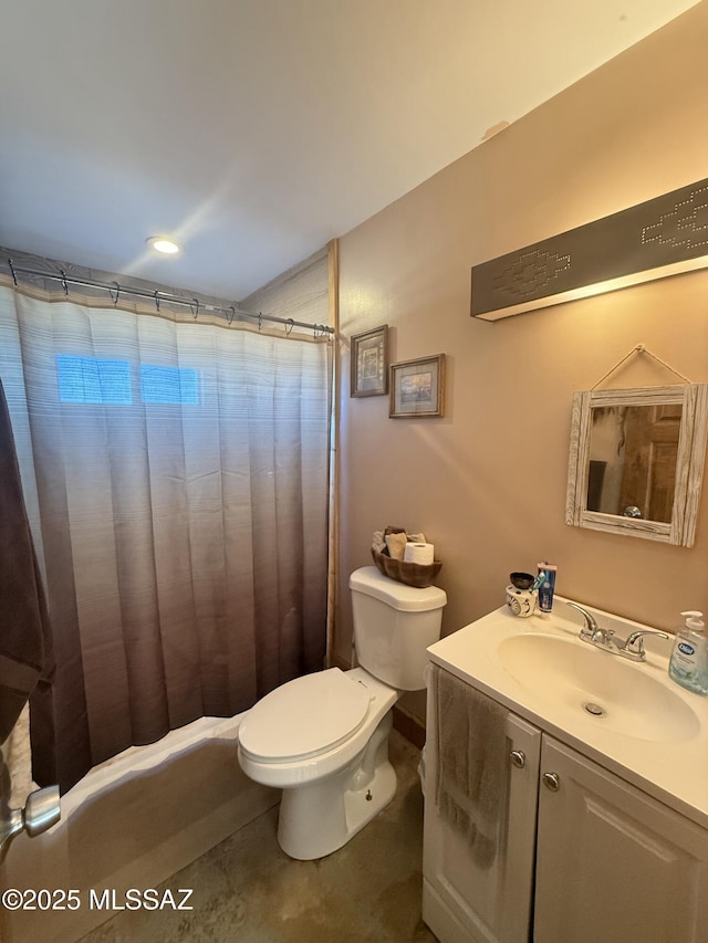 bathroom with toilet, curtained shower, tile patterned floors, and vanity