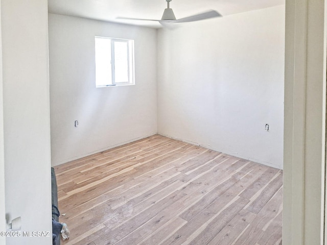 empty room with wood finished floors