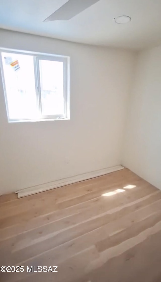 unfurnished room featuring wood finished floors