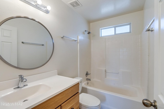 full bath with toilet, washtub / shower combination, vanity, and visible vents