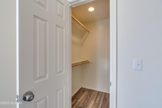 spacious closet with wood finished floors