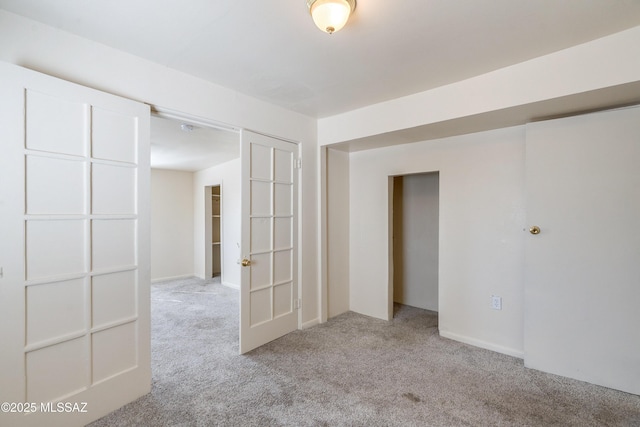 empty room featuring carpet flooring