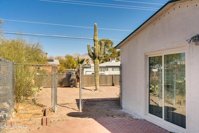 view of yard featuring a gate and fence