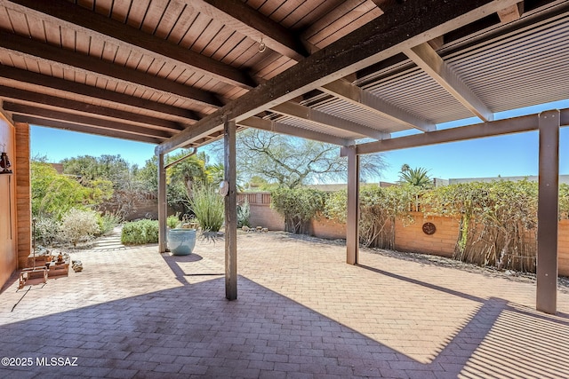 view of patio featuring a fenced backyard and a pergola