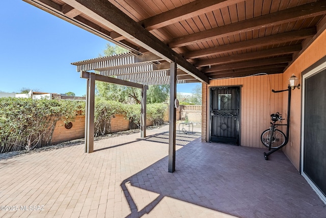 view of patio with a fenced backyard and a pergola