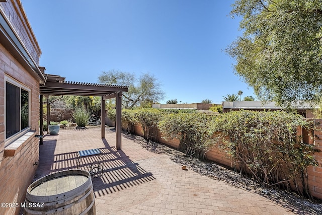 view of patio with a fenced backyard