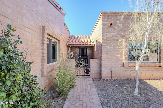 exterior space featuring a gate