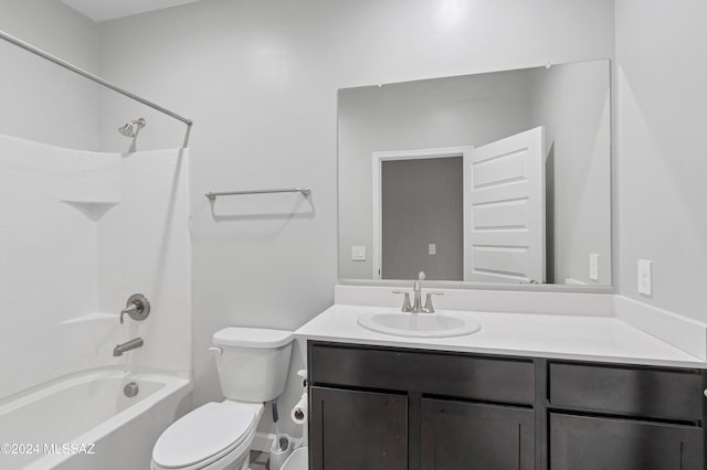 full bath featuring shower / bathing tub combination, vanity, and toilet