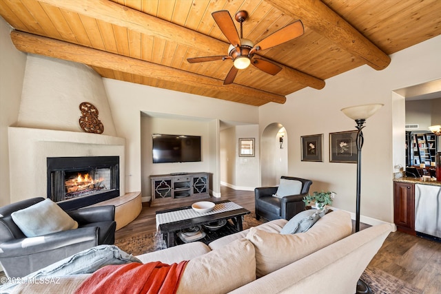 living area featuring wood ceiling, beam ceiling, arched walkways, and dark wood-style flooring