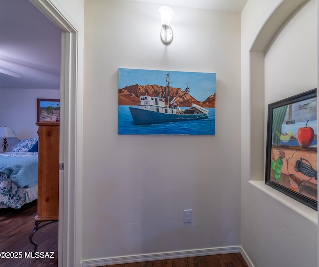 details with wood finished floors and baseboards