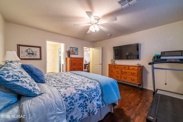 bedroom featuring dark wood-style floors, visible vents, baseboards, and a ceiling fan