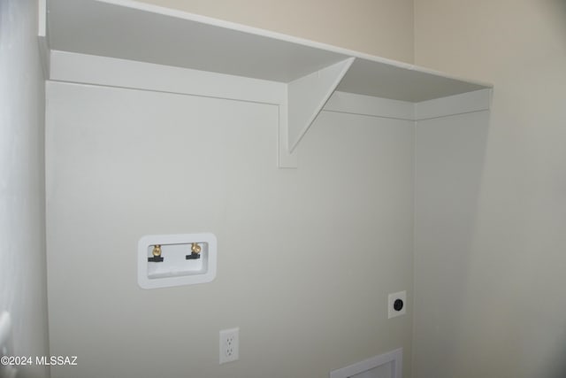 laundry area with washer hookup, laundry area, and hookup for an electric dryer