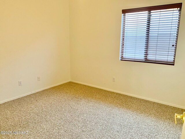 carpeted bedroom with baseboards