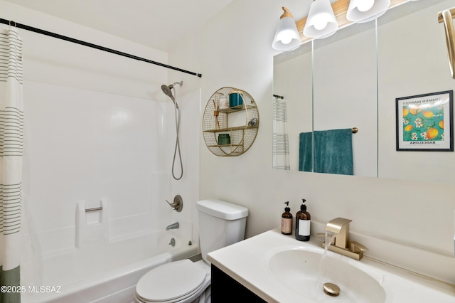 full bath with vanity, toilet, and shower / bath combo