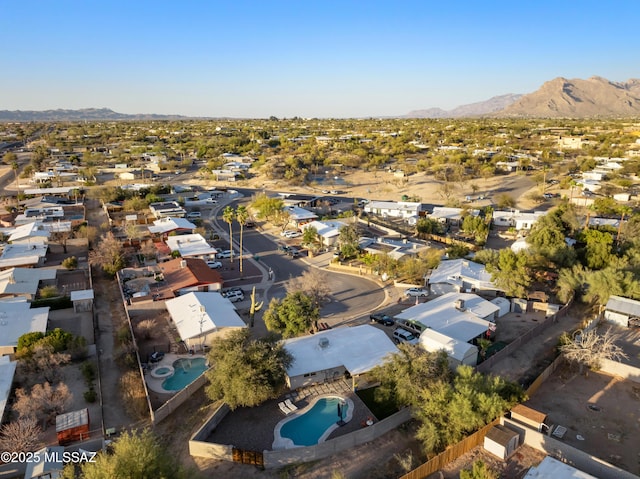 birds eye view of property with a mountain view and a residential view