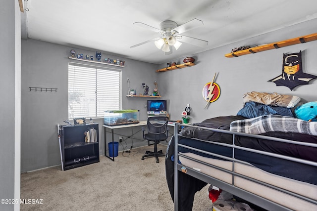 bedroom featuring carpet flooring and a ceiling fan