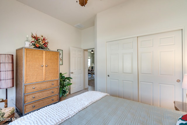 bedroom with a closet and visible vents