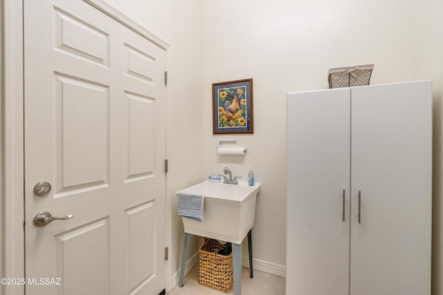 bathroom featuring baseboards