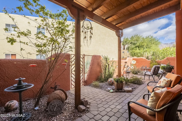 view of patio with fence