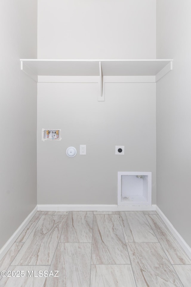 laundry area featuring washer hookup, laundry area, gas dryer hookup, electric dryer hookup, and marble finish floor