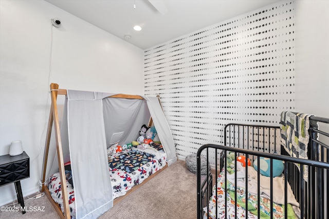 bedroom featuring baseboards and carpet flooring