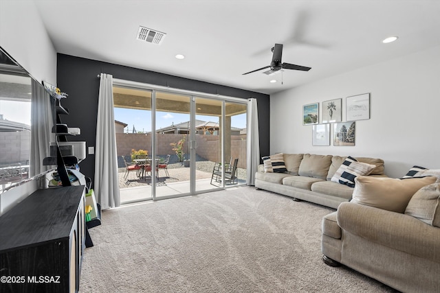 living room with visible vents, carpet floors, recessed lighting, and ceiling fan