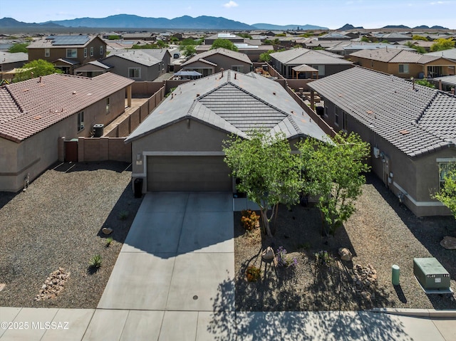 bird's eye view with a mountain view and a residential view