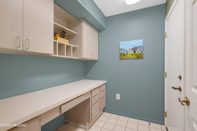 interior space featuring light tile patterned floors