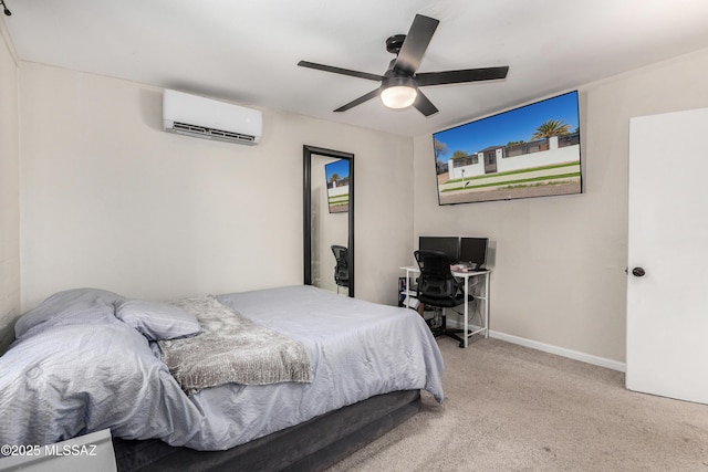 bedroom featuring ceiling fan, an AC wall unit, carpet, and baseboards