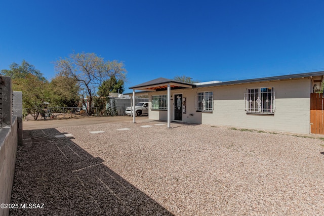 back of house with a patio area and a fenced backyard