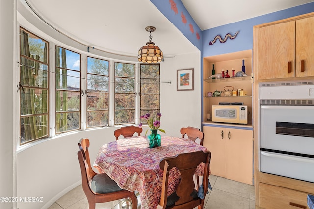 dining room with light tile patterned floors