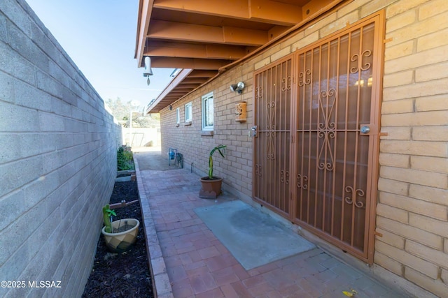 view of patio featuring fence