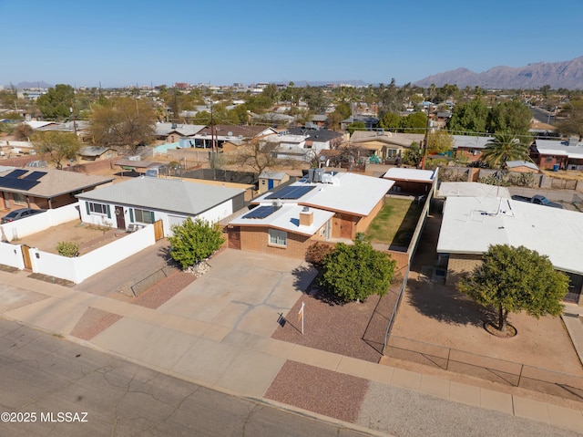 drone / aerial view featuring a mountain view and a residential view