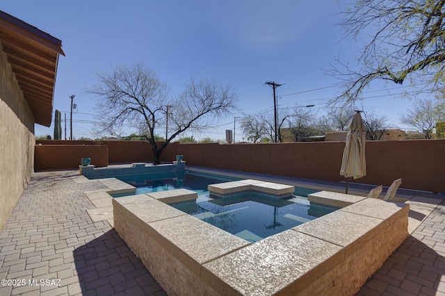 view of pool with a patio, a fenced backyard, a fenced in pool, and an in ground hot tub