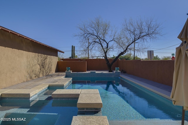 view of swimming pool featuring a fenced in pool and a fenced backyard