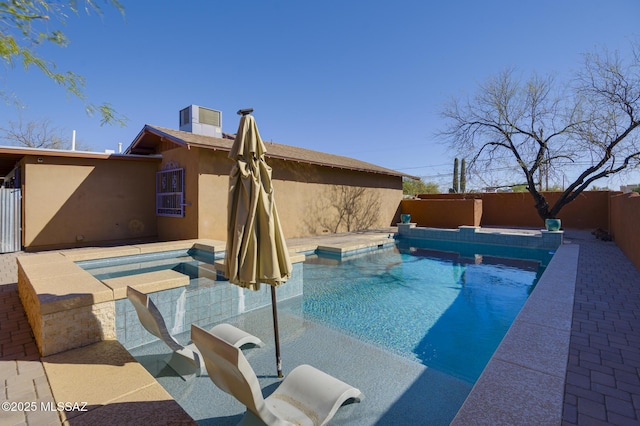 view of swimming pool with a fenced in pool and a fenced backyard