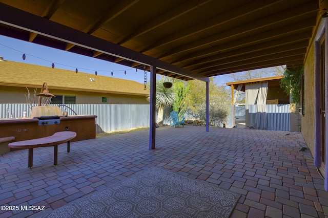 view of patio with fence