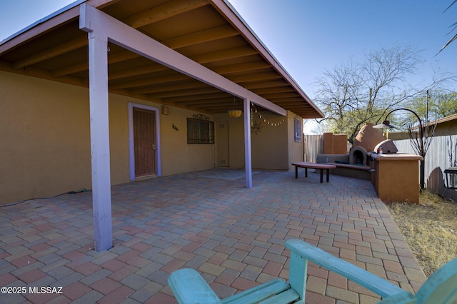 view of patio with fence