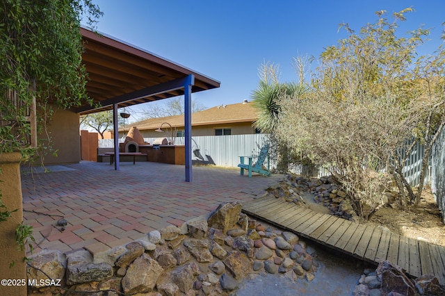 view of patio / terrace with fence