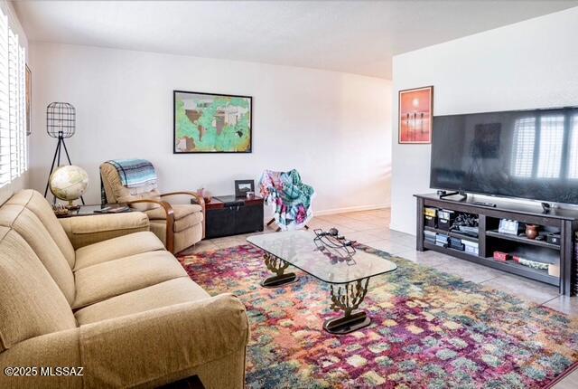 35 E Pastime Rd, Tucson, AZ 85705 - living area featuring plenty of natural light and tile patterned flooring