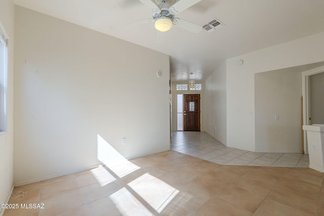 unfurnished room featuring visible vents, a ceiling fan, and light tile patterned flooring