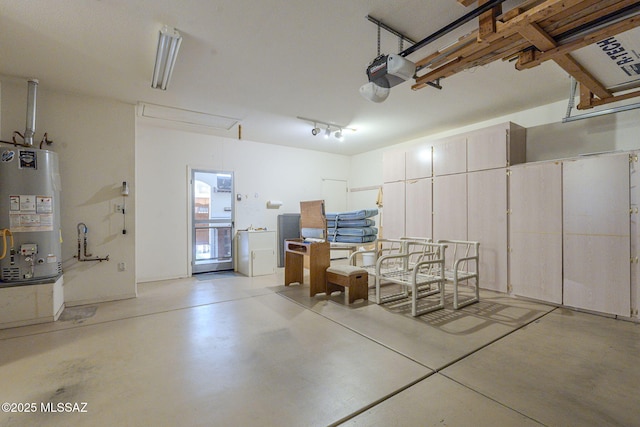 garage featuring gas water heater and a garage door opener