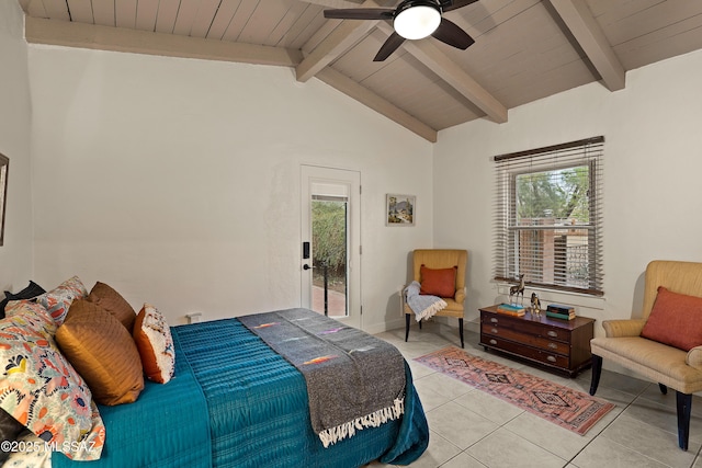 bedroom with lofted ceiling with beams, ceiling fan, light tile patterned floors, and multiple windows